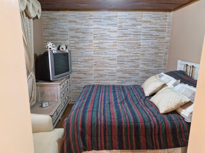 Gestimob vende amplia casa de un piso en pasaje Aulén , Villa Robert Kennedy, Estación Central - Imagen 8