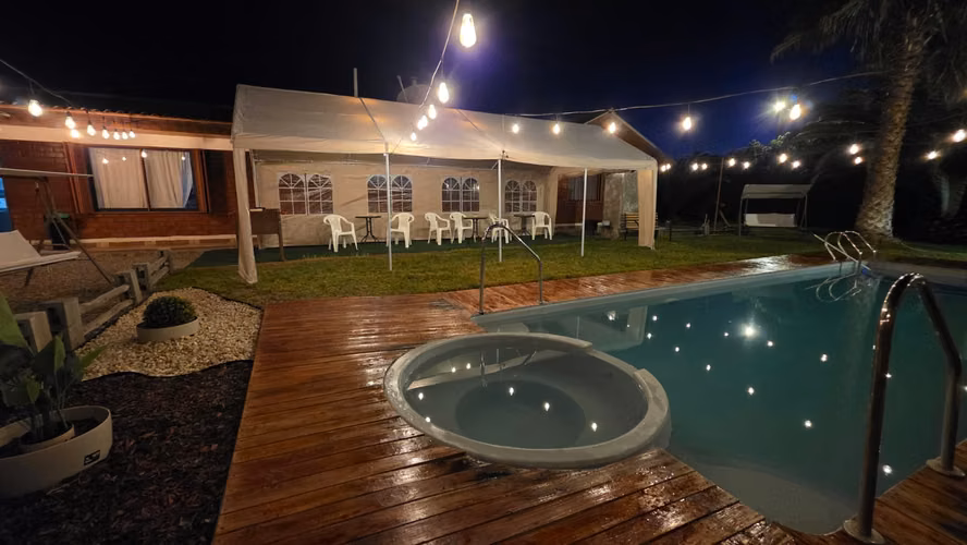 VENTA DE PARCELA CON CASA  PISCINA Y QUINCHO  DOS HERMANAS