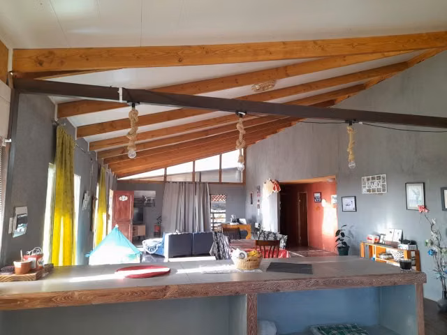 Venta de parcela con casa en Altos de Miraflores – Pica.