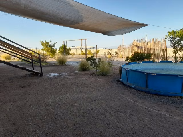 Venta de parcela con casa en Altos de Miraflores – Pica.