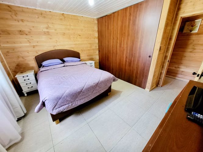 Parcela con orilla de rio y casa en Pucón