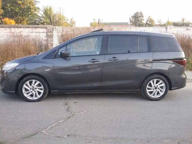 Mazda 5 automática año 2014 Station Wagon 3 corridas de asientos - Imagen 6