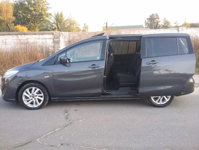 Mazda 5 automática año 2014 Station Wagon 3 corridas de asientos - Imagen 7