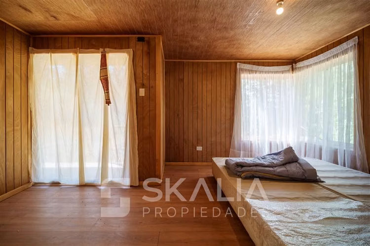 Parcela en venta en Altos de Coliumo. Con 3 casas. 4.750 m2.
