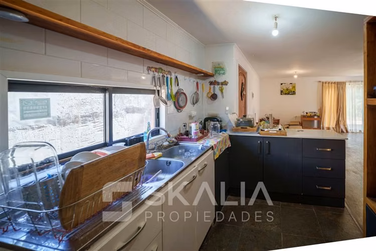 Parcela en venta en Altos de Coliumo. Con 3 casas. 4.750 m2.