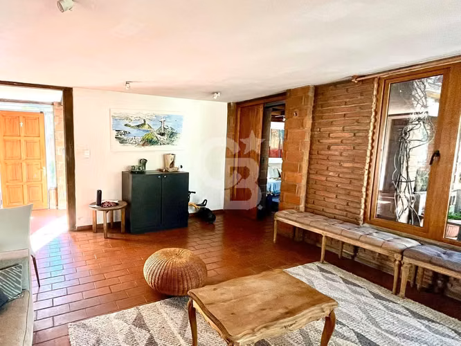 Casa en La Reina: Exquisito Entorno y Comodidad Total