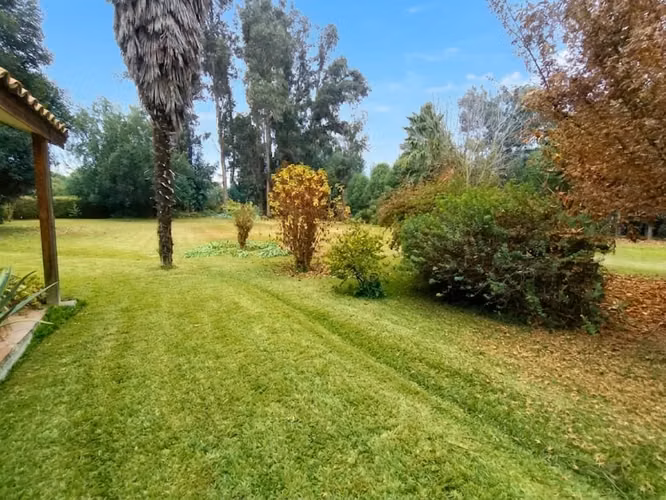 ARRIENDO PARCELA CON CASA DE 4D/4B CERCANA AL COLEGIO CARAMPANGUE