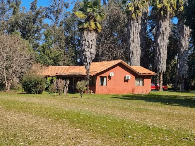 ARRIENDO PARCELA CON CASA DE 4D/4B CERCANA AL COLEGIO CARAMPANGUE