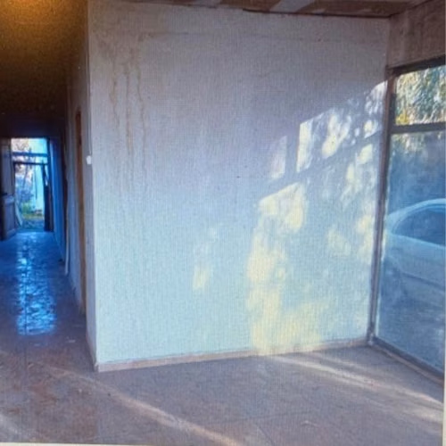 amplio terreno con casa casi terminada centro pueblo hundido