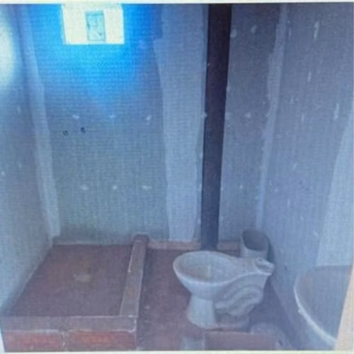 amplio terreno con casa casi terminada centro pueblo hundido