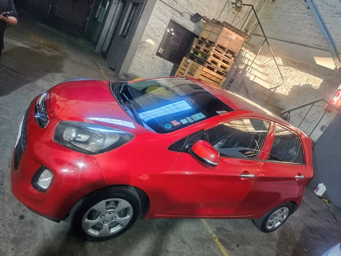Kia Morning 2016, 119.331 km. Motor 1.2 bencinero, transmisión manual, muy económico en consumo. - Imagen 4