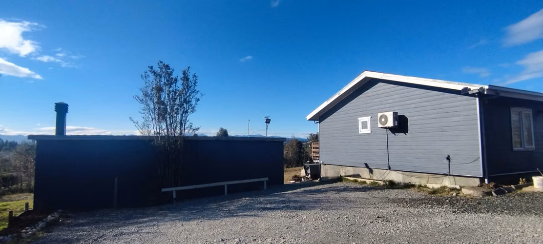 PARCELA CON 3 CASAS Y 1 QUINCHO