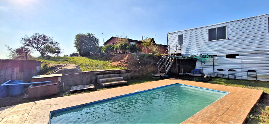 Parcela con casa y gran quincho en venta en Limache, 5.000 m2. - 118 M$