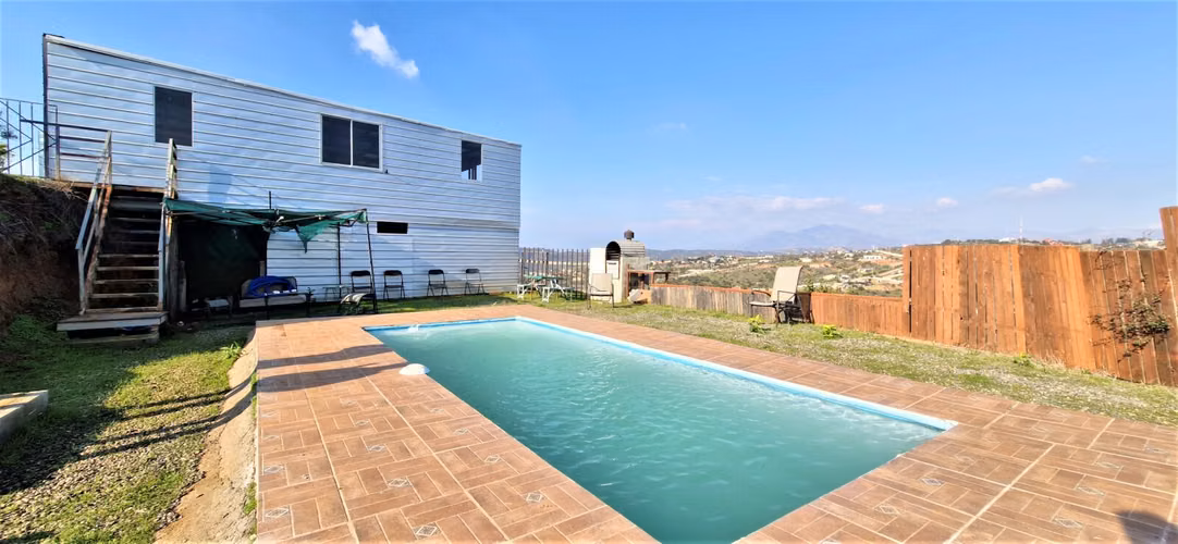 Parcela con casa y gran quincho en venta en Limache, 5.000 m2. - 125 M$