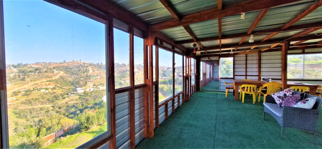 Parcela con casa y gran quincho en venta en Limache, 5.000 m2. - 125 M$