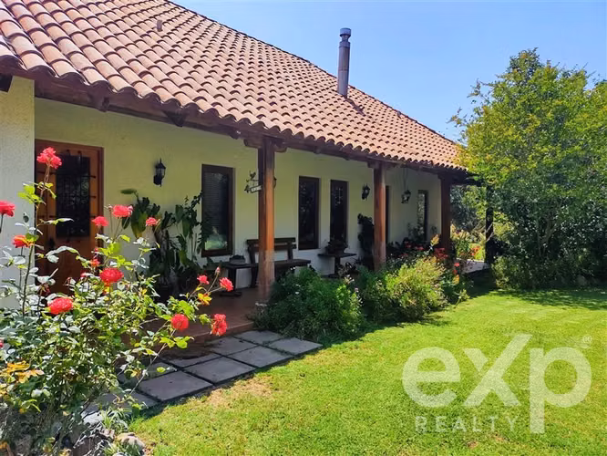 OLMUÉ parcela vende. Céntrica. 2 casas, gran jardin, agua.
