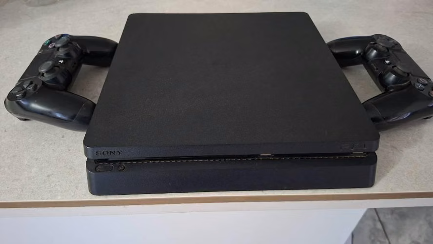 PS4 slim 1tera