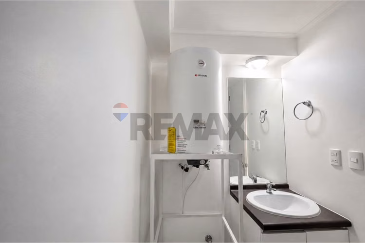 Acogedor  céntrico en santiago ideal inversión - Imagen 15