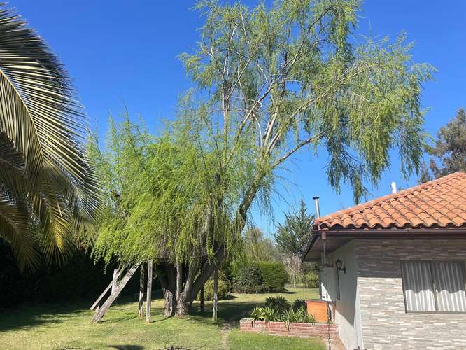 PARCELA SOÑADA CON PISCINA Y CASA FAMILIAR EN CONDOMINIO
