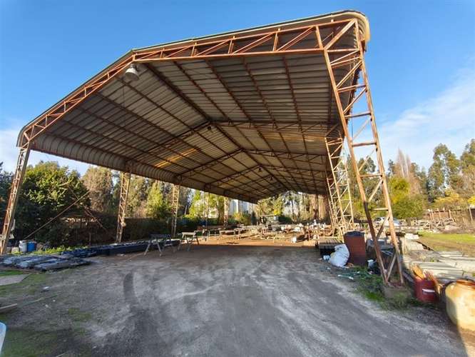 CASA CON GRAN TERRENO Y GALPÓN COMERCIAL