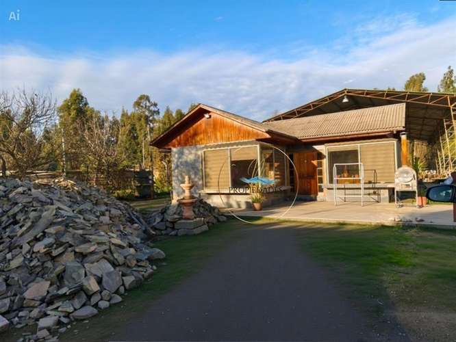 CASA CON GRAN TERRENO Y GALPÓN COMERCIAL