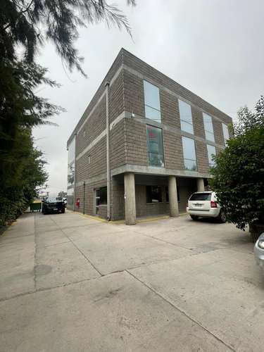 Arriendo edificio a empresa area comercial