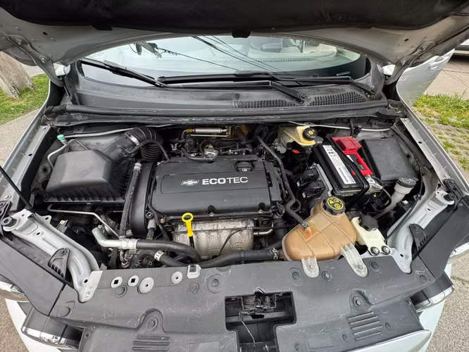 CHEVROLET SONIC LT 1.6 MEC FULL AIRE AIRBAG VER EN LAS CONDES 2013 - Imagen 19