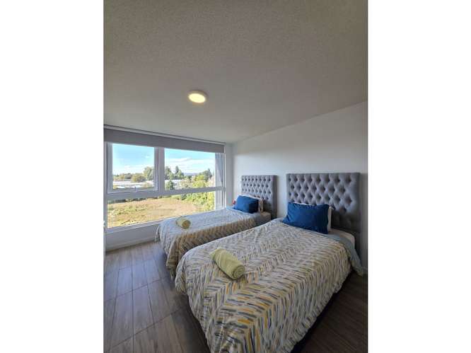 Departamento 2D2B en Arriendo Amoblado Isla Teja - Imagen 12