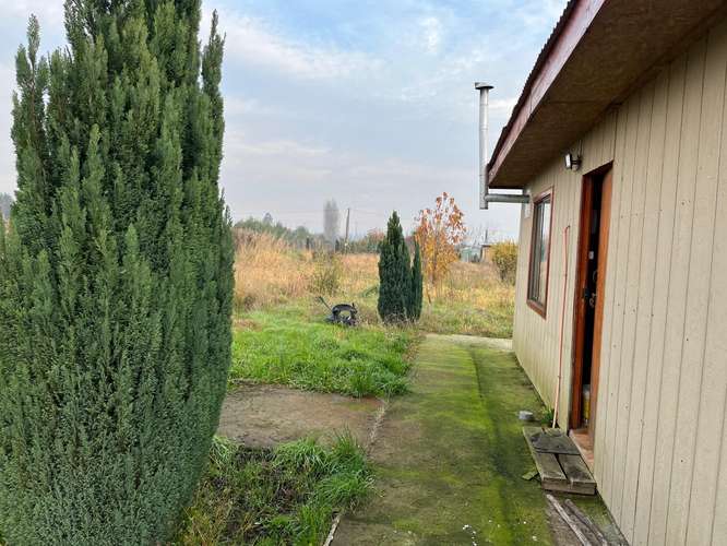 PARCELA CON CASA  Y RIEGO CAMINO A CERRO COLORADO LOS ÁNGELES