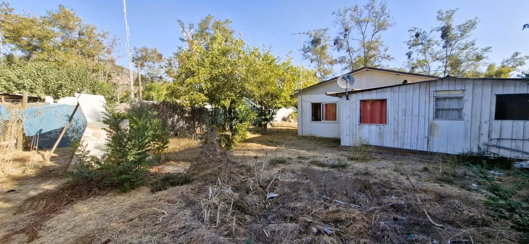 En venta de sitio de 1.300 m2., con 2 casas y una cabaña, en Olmué. 100 M$ - Imagen 11