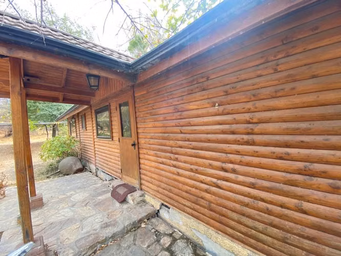 SE VENDE TERRENO con CASA LAGO RAPEL 8400MTRS reconstruir