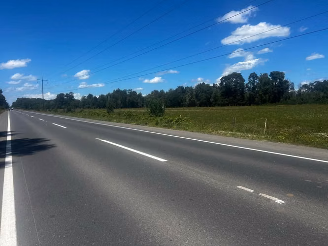 excelente oportunidad parcela de 1,5 hectareas por ruta 215 con 100  mtrs de carretera de frontis