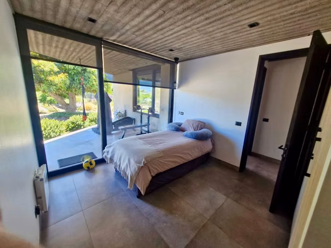 VENTA DE MODERNA Y EXCLUSIVA CASA EN LIMACHE - Imagen 12
