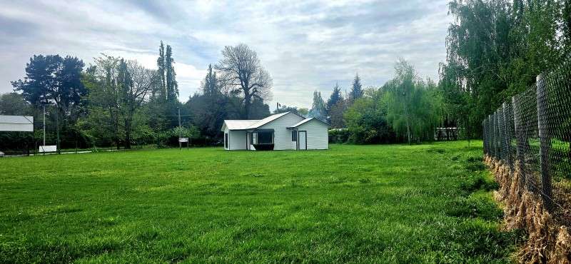 Vendo sitio de 5.000 con frente a Camino Antuco