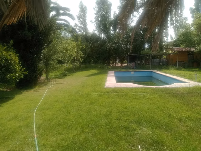 Parcela con casas  en Chiñigue, El Monte
