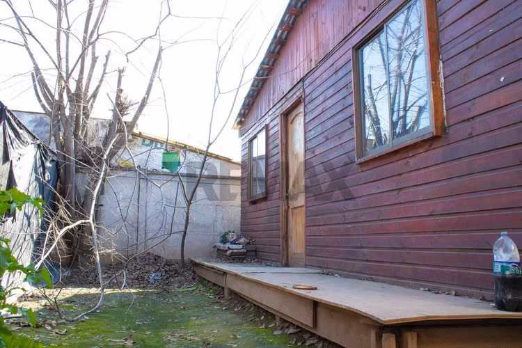 Casa con gran terreno y galpón en huechuraba - Imagen 10