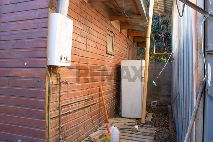 Casa con gran terreno y galpón en huechuraba - Imagen 11
