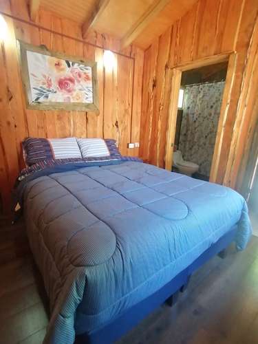 VENTA PARCELA CON CABAÑAS PARA ARRENDAR