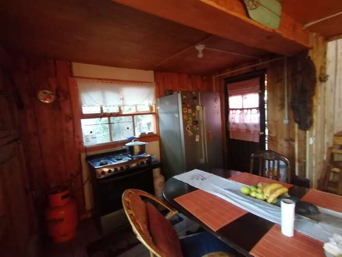VENTA PARCELA CON CABAÑAS PARA ARRENDAR