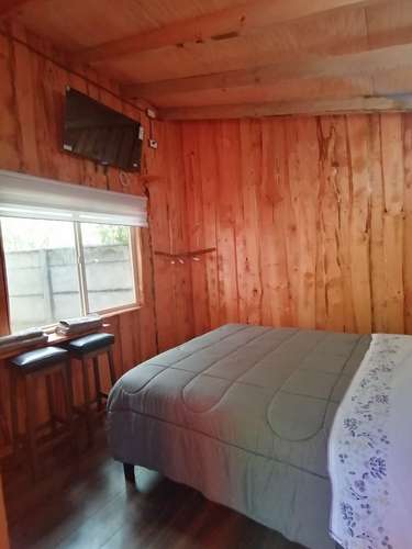 VENTA PARCELA CON CABAÑAS PARA ARRENDAR
