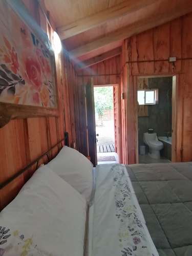 VENTA PARCELA CON CABAÑAS PARA ARRENDAR