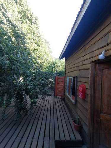 VENTA PARCELA CON CABAÑAS PARA ARRENDAR