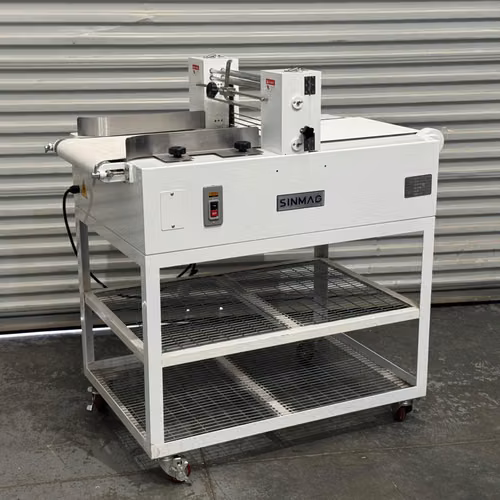 Máquina rebanadora de bizcocho SINMAG casi nueva