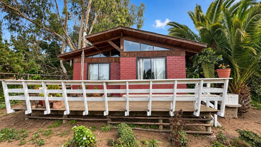 CASA CON AMPLIO TERRENO EN HORCÓN CENTRO A PASOS DE LA PLAYA