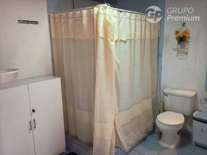 Acogedora Casa de 3D 1B.con potencial en venta Est. Central - Imagen 14