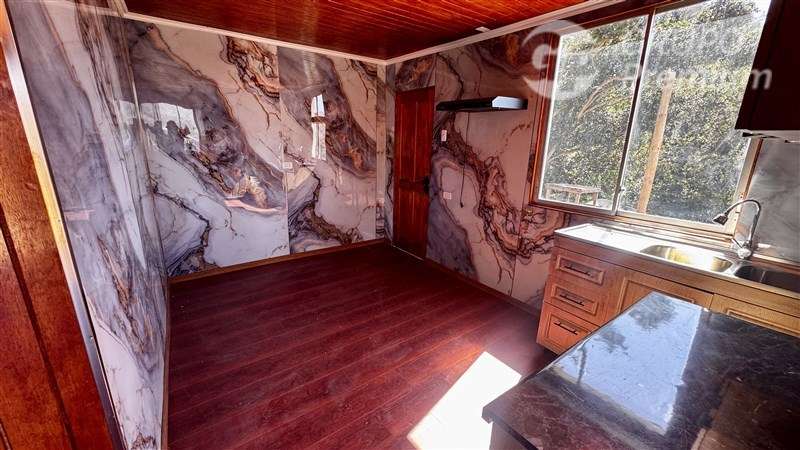 PARCELA CON CASA EN SECTOR RESIDENCIAL DE CURACAVI - Imagen 10