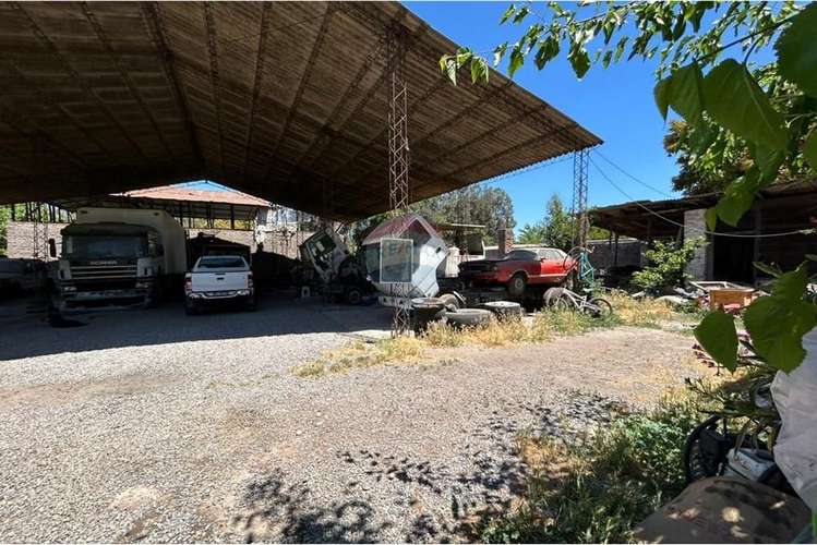 Arriendo de terreno con galpón en viluco.
