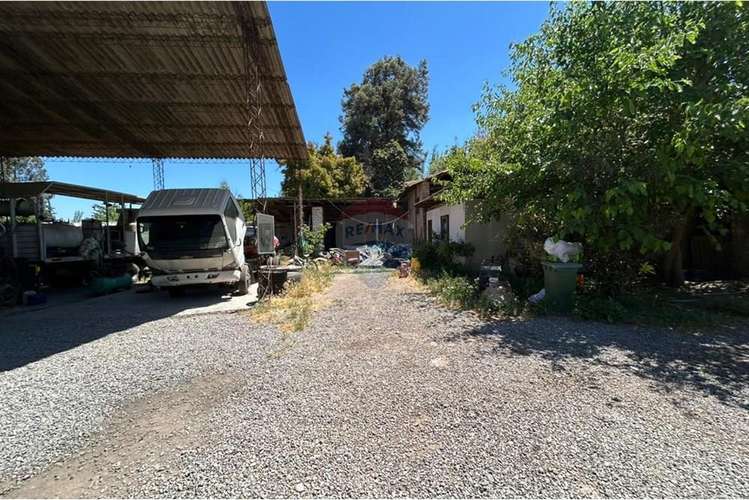 Arriendo de terreno con galpón en viluco.