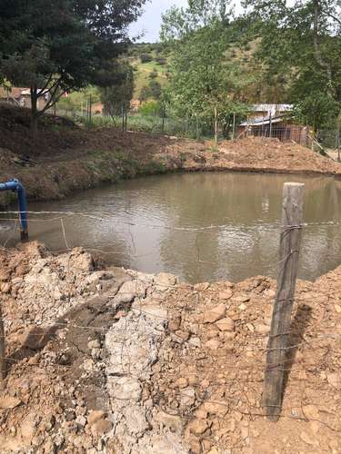 Terreno agrícola con derechos de agua, casa y piscina