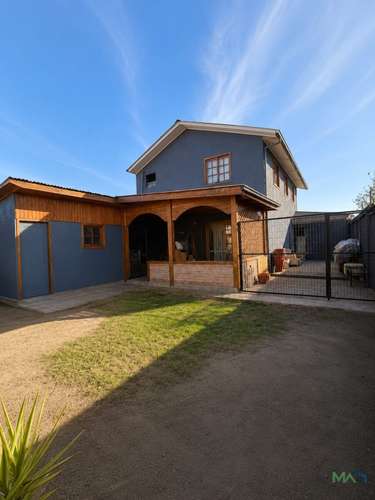 Propiedad Comercial en Av. Eyzaguirre con Santo Domingo, Puente Alto | Casa y Galpones